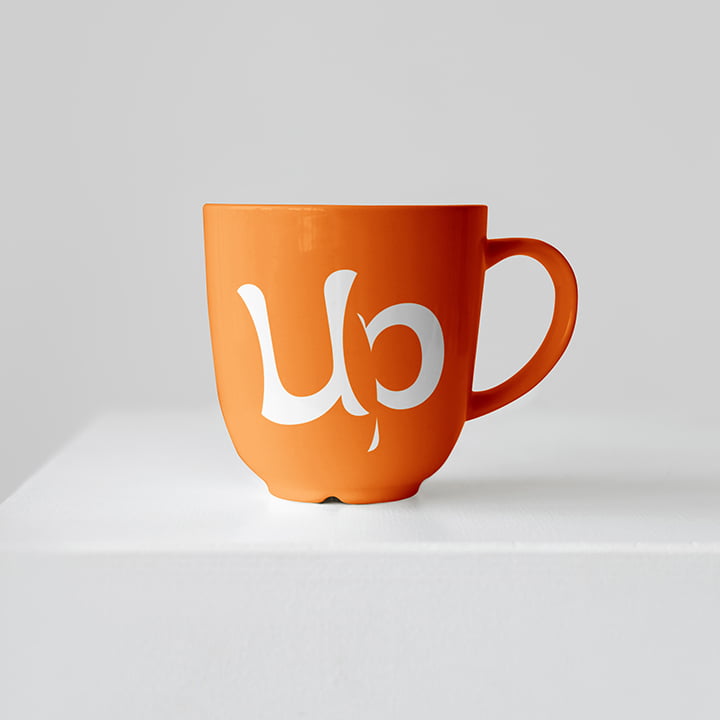 Our work Uniting People Nonprofit Logo Design on Coffee Mug